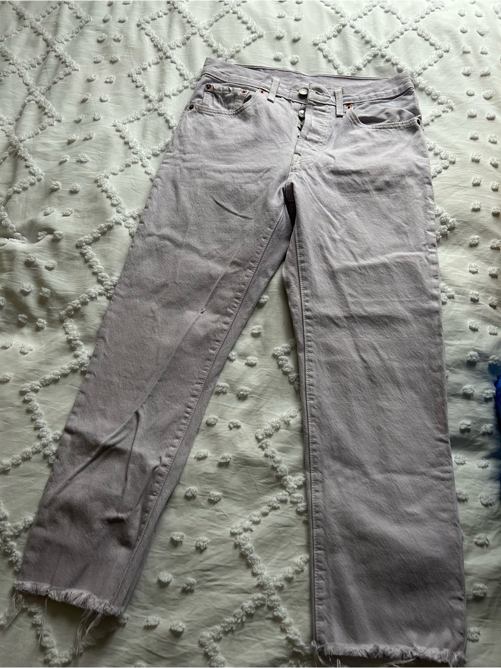 Levi’s 501 Lilac Cotton Denim Cropped Raw Cuff Jeans. Measures 30” by 25”